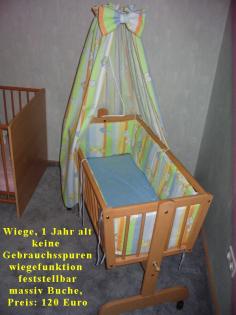 Wiege mit feststellbarer Schaukelfunktion