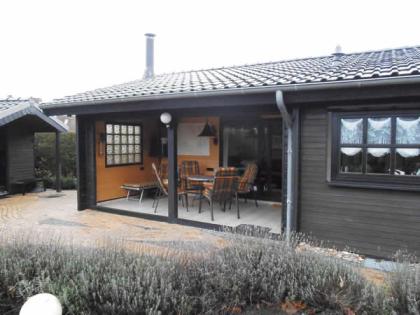 Ostsee-Ferienhaus Wikinger mit Sauna im Garten und Kamin