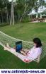 Moderne Heimarbeit mit einem Job am PC 