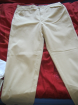 Cremefarbende Jeans