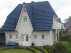 Ostsee-Ferienhaushälfte Friesenhaus Kalifornien mit großem Garten
