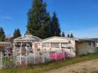 Landhaus mit Wohnwagen auf Dauercampingplatz